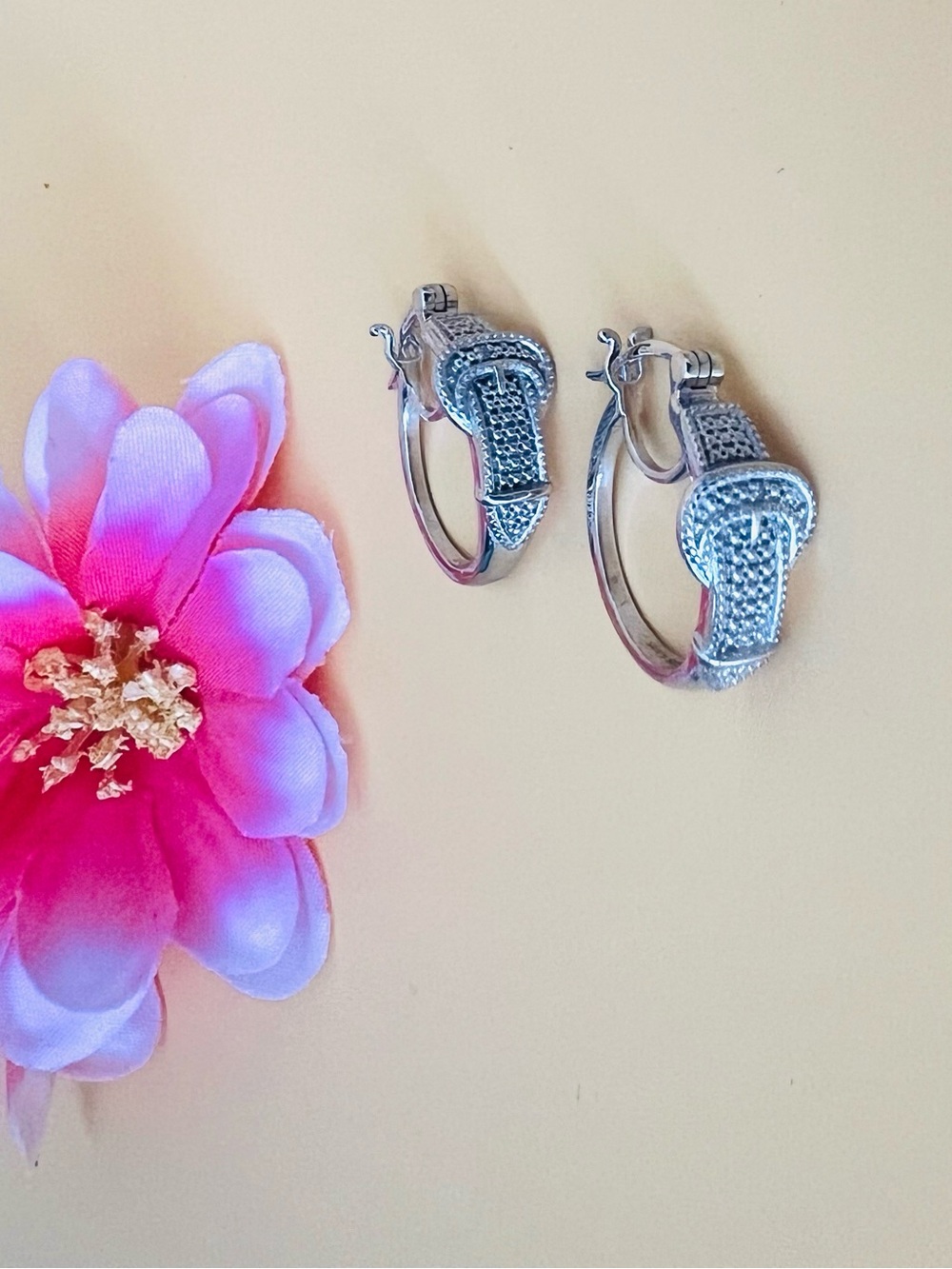 Diamond Accent Buckle earrings, platinum bond, NWOT